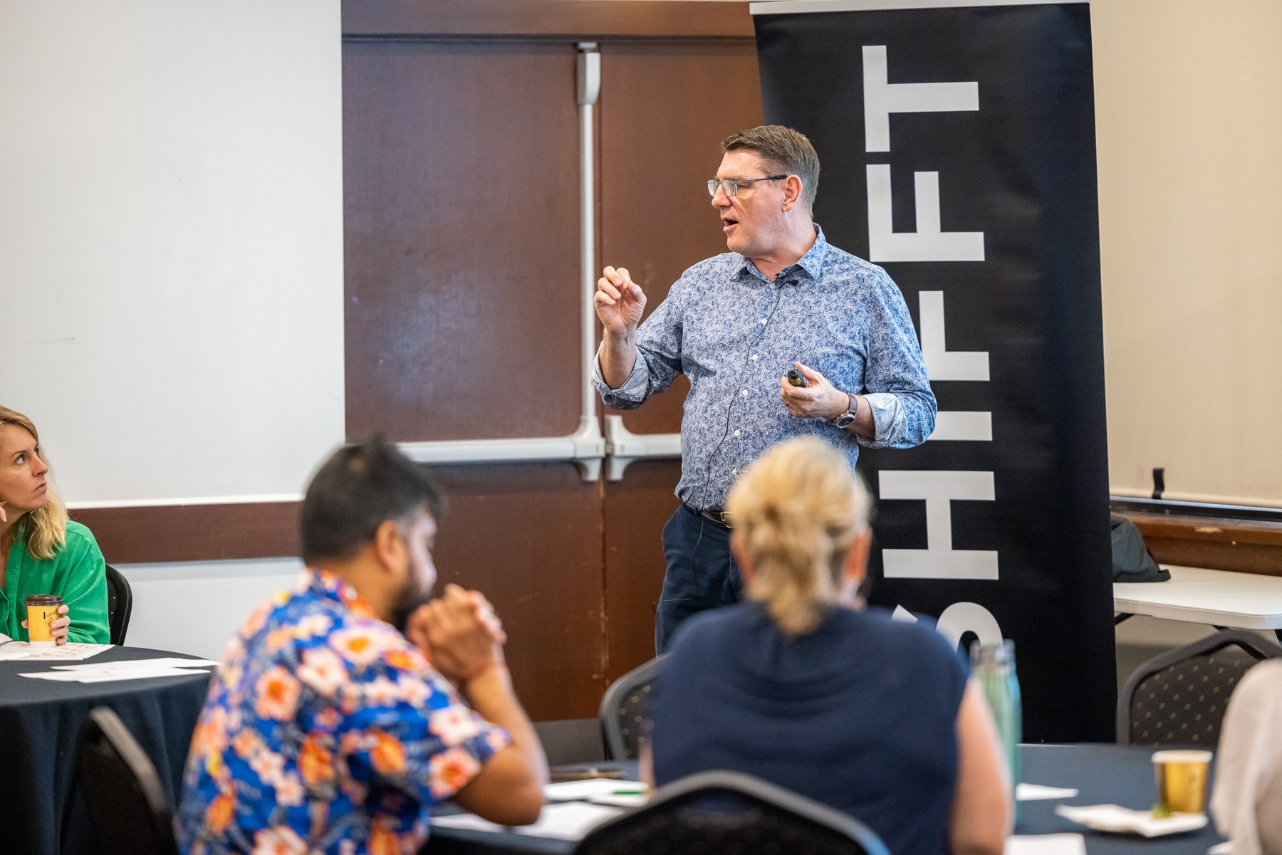 Russell Cummings discussing ideas with business workshop participants